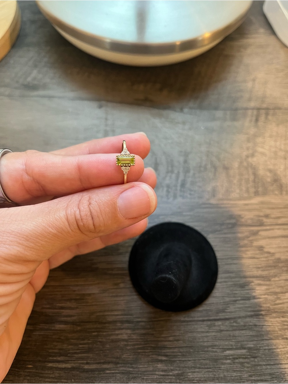 Gold Ring with Light Green Peridot Center Stone
